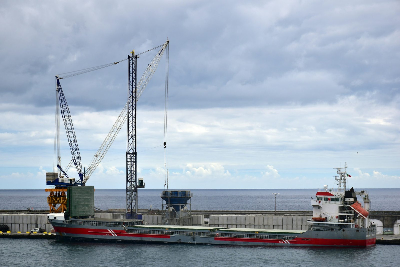 a large ship with cranes
